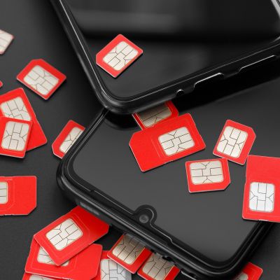 Two,Cell,Phones,And,A,Lot,Of,Sim,Cards.,The